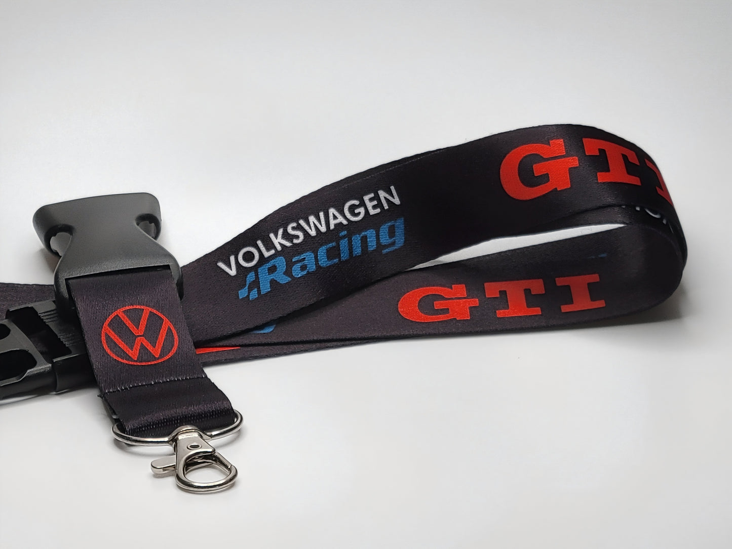 Volkswagen GTI lanyard featuring the iconic GTI and Volkswagen Racing logos.