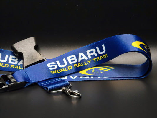 Subaru lanyard featuring the iconic Subaru World Rally Team logo.