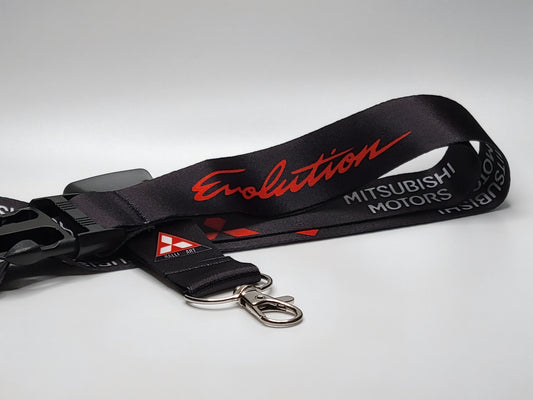 Mitsubishi Evolution lanyard featuring the iconic Evolution logo and Mitsubishi Motors branding.