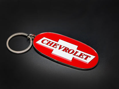 High-quality retro Chevy Trucks keychain on a dark background, showcasing the polished silver-tone rim and durable linked chain.