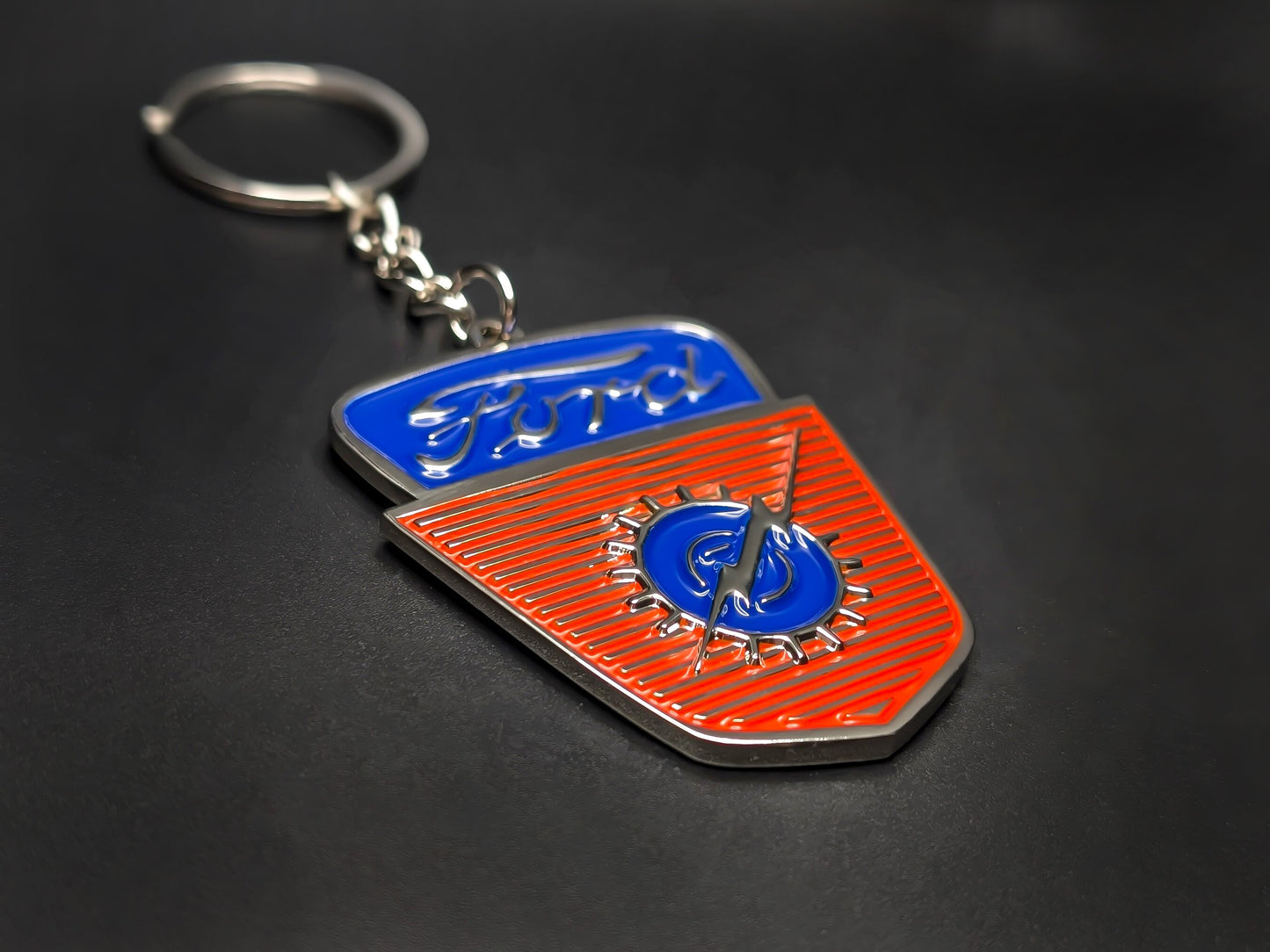High-quality retro Ford F-100 heritage keychain on a dark background, showcasing the glossy enamel finish and sturdy silver link chain.