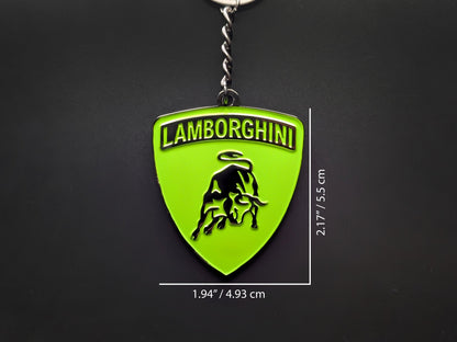 Dimension shot of the Lamborghini green badge keychain showing a size of 2.17 inches by 1.94 inches (5.5 cm by 4.93 cm).