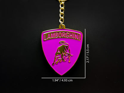 Dimension shot of the Lamborghini purple badge keychain showing a size of 2.17 inches by 1.94 inches (5.5 cm by 4.93 cm).