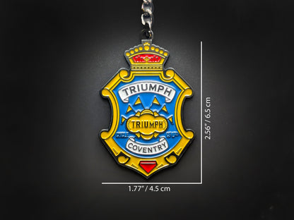 Dimensions of the Triumph badge keychain showing a size of 2.56 inches by 1.77 inches (6.5 cm by 4.5 cm).